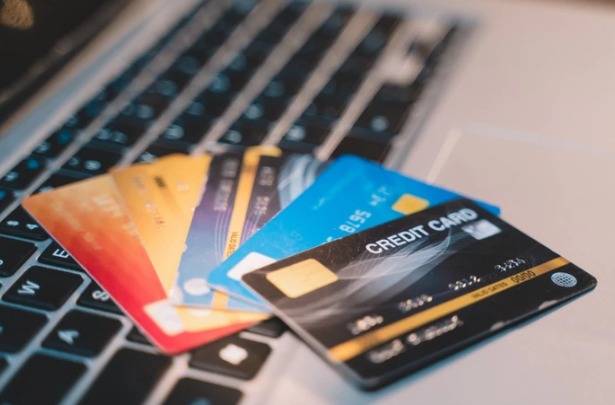 Think sharing your credit card is harmless? The financial, legal, and credit score risks can be more expensive